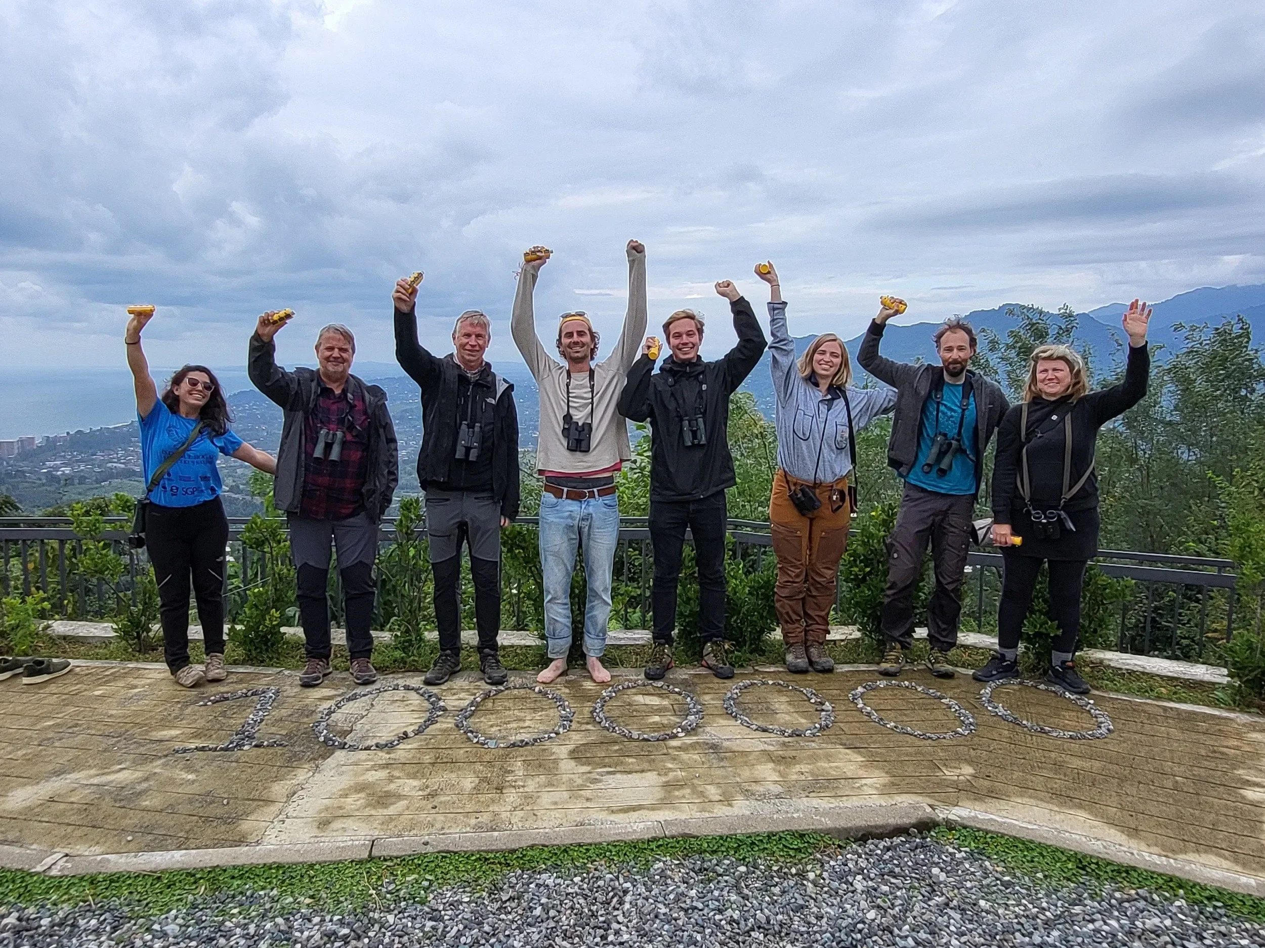 Counters celebrating after reaching one million raptors counted